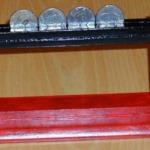 Sensational Coin Stand by Sam Dalal