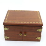 The West Die Box (Natural Wood) by Mel Babcock, Bud West