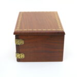 The West Die Box (Natural Wood) by Mel Babcock, Bud West