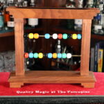 The Oriental Bead Rack (#2 of 3) by Louis Paul Productions, Joseph Ovette