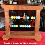 The Oriental Bead Rack (#2 of 3) by Louis Paul Productions, Joseph Ovette